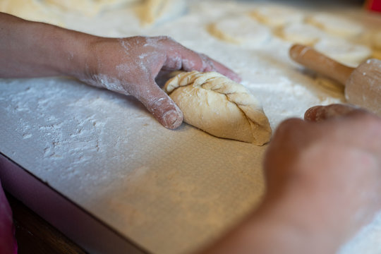Making of kibinai - Lithuanian traditional pastry pie with meat.