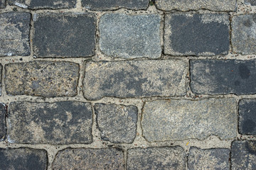 old cobblestone road for background or texture