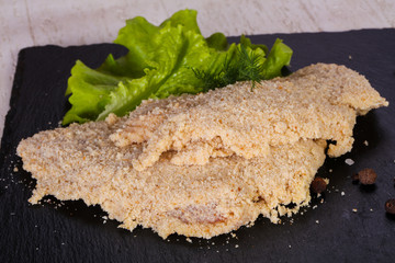 Raw pork schnitzel