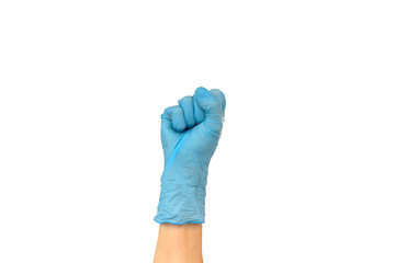 Woman's hand in a blue glove is clenched into a fist. Isolate on white background. Concept of power and victory