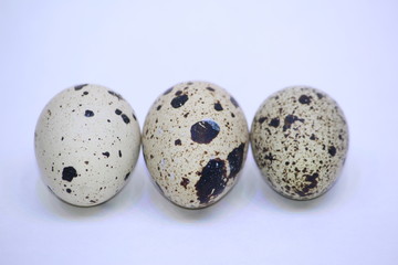 group of quail eggs, isolated on white background
