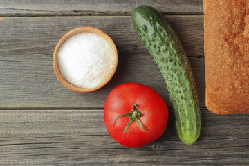 Bread, salt, cucumber and tomato