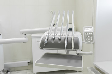 Stomatological instrument in the dentists clinic. Dental background: work in clinic (operation, tooth replacement)