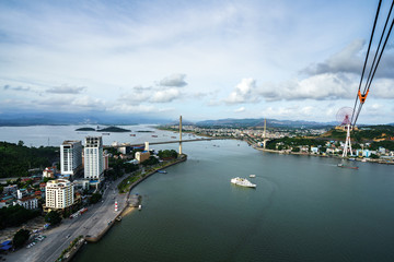 Obraz premium Halong city aerial view with Bai Chay bridge in Quang Ninh province, Vietnam