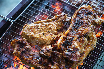Meat on the grill with flame. Outdoor bbq