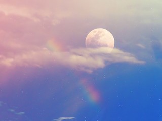 The big moon with beautiful rainbow on pastel sky background.