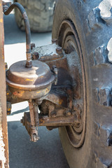 wheel brakes the old excavator on the street day