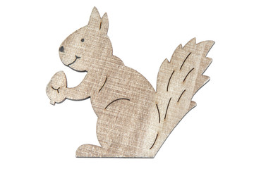 Close up wooden decoration of a squirrel isolated on a white background.