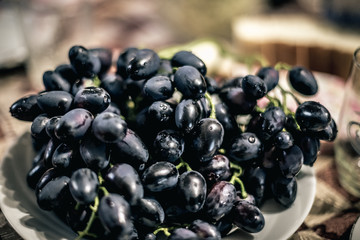 Black grape on a plate