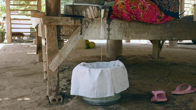 Soaked rice flour collected out of wet rice grinding with millstone ( close up)