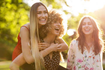 Female friends on sunny summer evening
