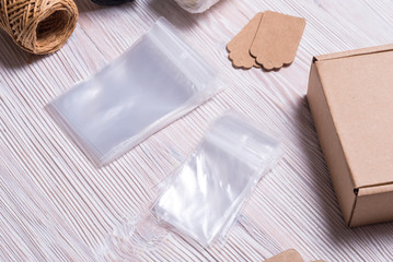 Clear polythene zip lock on wood desk
