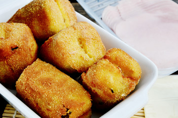 Simple vegetable Menu for children. 
Breaded zucchini  fried with ham and cheese.