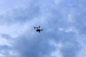 The drone in the cloudy sky