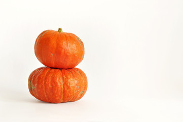 Isolated photo of pumpkin. Orange pumpkin on the white background. use for postcards, wallpapers, textiles, scrapbooking, decoration, invitations, background, holiday.