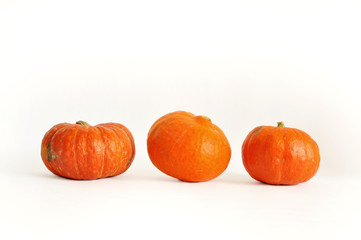 Isolated photo of pumpkin. Orange pumpkin on the white background. use for postcards, wallpapers, textiles, scrapbooking, decoration, invitations, background, holiday.