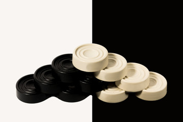  Black and white chips on black and white background.