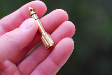 Jack adapter between finger