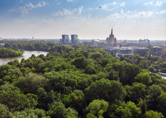 Fototapeta na wymiar Bucharest city, aerial view of Herastrau park and buildings