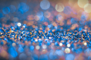 Abstraction colorful bokeh on a dark background. Defocused.