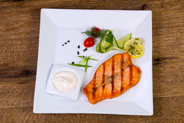 Grilled salmon with sauce