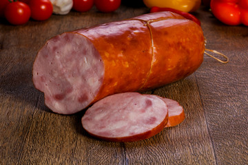 Pork sausages over wooden