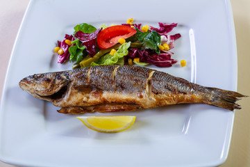 Grilled seabass with lemon