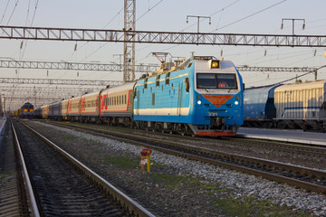 Fototapeta na wymiar Moving train on the railway station