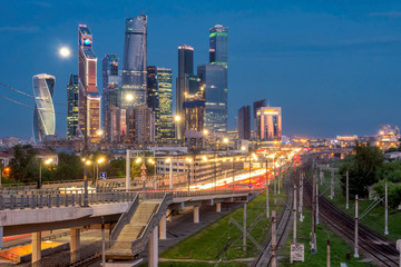Fototapeta premium Car traffic in front of Business center Moscow City. Evening view