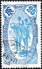 Bedouins on ancient postage stamp of Somalia