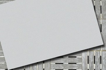 Blank Sheet of Paper / gray blank sheet of paper on gray background, close up, full frame 