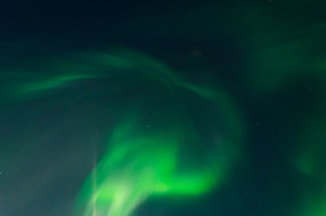 Fototapeta premium Aurora, Northern lights in the winter in the sky.