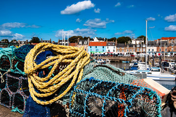 Lobster traps on a pier in Anstruther village, Fife.