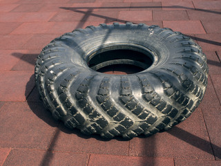A large tire for the fitness of the territory of the hotel Gorki Krasnaya Polyana Sochi 09/01/2018