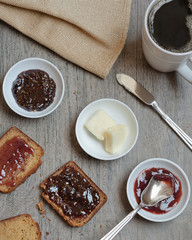 Home made paleo, gluten free bread served with jam, butter and coffee.