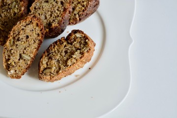 Tasty buckwheat bread on the white plate.