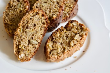 Tasty buckwheat bread on the white plate.