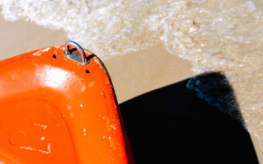 prow of the boat on the sandy beach - - simple abstract design background