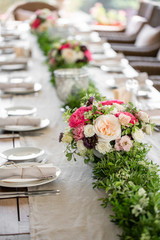 Wedding Banquet or gala dinner. The chairs and table for guests, served with cutlery and crockery....