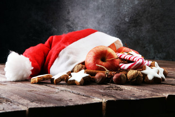 christmas cookies and santa had with spieses, nuts and fruits.