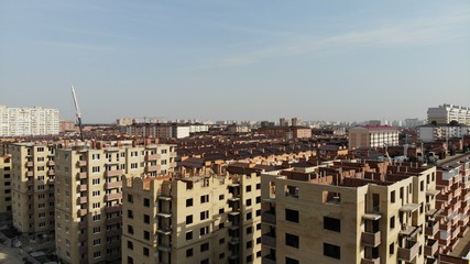 Aerial view of the unfinished buildings. Aerial view of the houses in the Krasnodar.