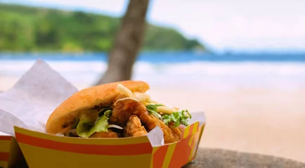 Fotobehang Fried shark and bake fast food by beach Maracas Bay © Altin Osmanaj
