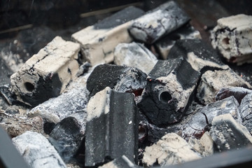 burning charcoal in the barbecue stove