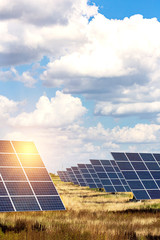 solar panels on the sky background © Sergii Mostovyi