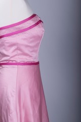 Tailors Mannequin dressed in a Pink Dress