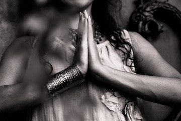 closeup of woman hands in namaste gesture outdoor shot - obrazy, fototapety, plakaty
