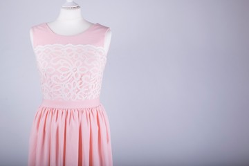 Tailors Mannequin dressed in a Pink Dress