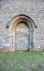 The old door is long gone. The door is closed forever. Forgotten building at the countryside of...
