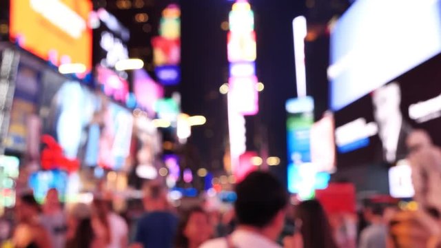 Times Square At Night out of focus people Manhattan, New York City