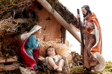 Christmas nativity scene with Holy Family in the hut, isolated on white background